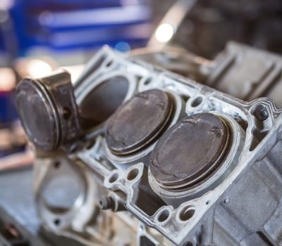 Close-up of car engine at repair garage