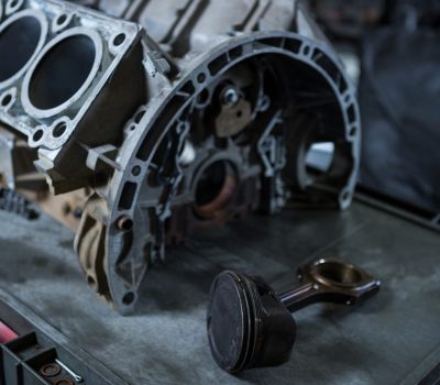 Close-up of car engine at repair garage